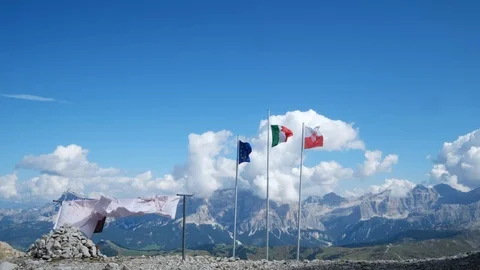 Dolomites mountains blowing flags Stock Footage 95833026