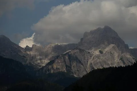 Dolomites mountains texture and clouds above Stock Photos