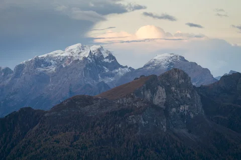 Dolomites peaks and clouds rolling behind them 8K Stock Footage 242523961