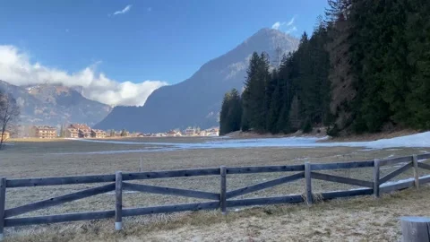 Dolomites. The source with thermal waters is in Italian Alps. Stock Footage 239343337