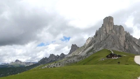 The Dolomites in the Summer with a large building Stock Footage 97312956