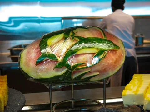 Dolphins on a watermelon Stock Photos