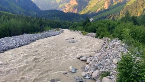 Dolra River flowing wide view through Mazeri valley in Svaneti at sunset Stock Footage 343767718