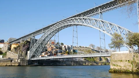 Dom Luis bridge and Douro river in Porto, Portugal on sunny day with blue sky. Stock Footage 104991530