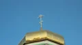 Dome and cross on a background of blue sky HD Footage