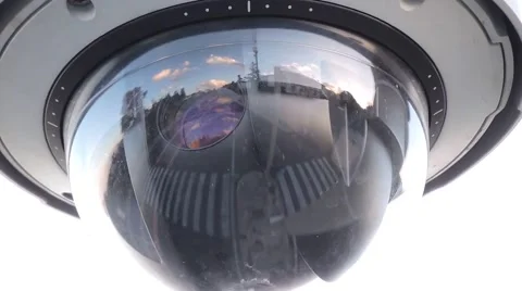 Dome camera, sky, clouds and cars reflection Stock Footage 49586587