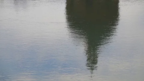 The dome of the Catholic temple is reflected in the water Stock Footage 106634000