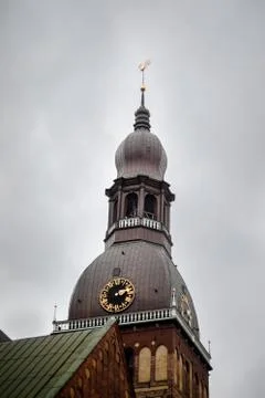 Dome of the clock tower on the background Stock Photos