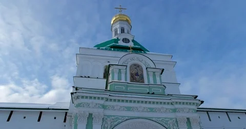 The dome of the gate of the Church of the ancient monastery, pigeons fly Stock Footage 67698984
