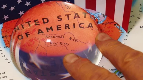 Dome magnifier pushed across a map, highlighting the USA. Stock Footage 70017778