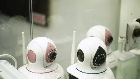 Dome secure cameras standing on glass showcase, security concept. Stock Stock Footage 104798334