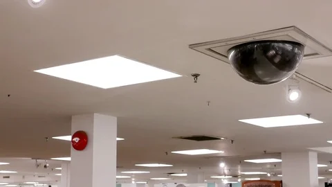 Dome security camera on top of ceiling inside Sears store Stock Footage 71331963