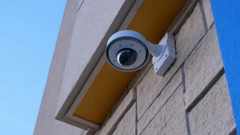 Dome security camera on top of ceiling outside Walmart store with 4k resolution Stock Footage 90922881