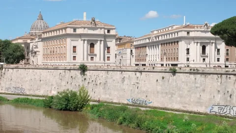 Dome of St. Peter Basilica in the Vatican from a viewpoint near Lungo Tevere Stock Footage 243971566