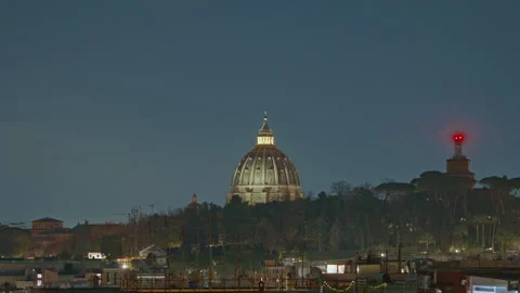 Dome of St. Peter's Basilica in the evening with illumination. Timelapse with Stock Footage 306760481