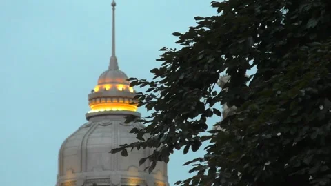 Dome at sunset in the City with Swaying Tree in Foreground Stock Footage 279171589