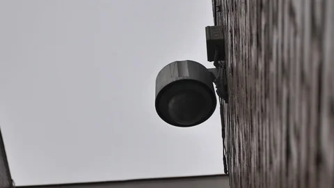 Dome surveillance camera on the building Stock Footage 106028163