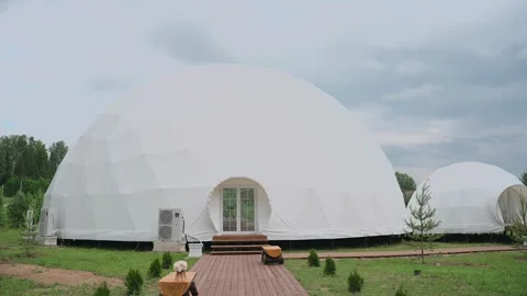 A dome tent for holidays, inside which people celebrate their holidays Video stock 328299369