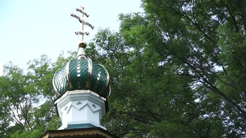 Domes of the church against the bright blue sky. Golden domes are rendered i Stock Footage 149967053