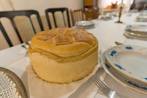 Domestic bread put on the table as a part of an Orthodox Christian tradition Stock Photos