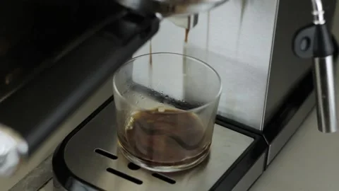 Domestic coffee maker preparing espresso coffee Stock Footage 219722240