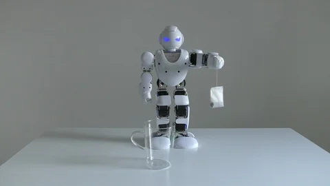 A domestic humanoid robot practicing brewing tea, poor artificial intelligence 動画素材 96590466