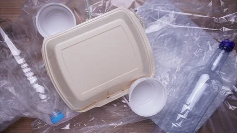 Domestic plastic waste piling up - stop motion animation Stock Footage 135594037