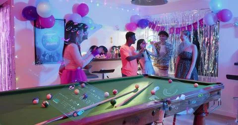 Dominating green pool table showing light projections at birthday party, with Stock Photos