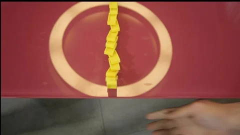 Domino blocks falling from a red desk 動画素材 266707779