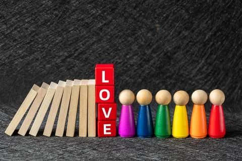 The domino effect is about to bring down the red blocks with the LGBT  Stock Photos