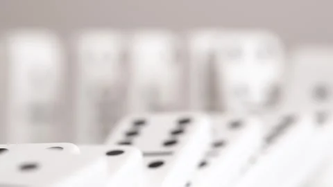 The Domino Effect in a macro shot Stock Footage 249907219