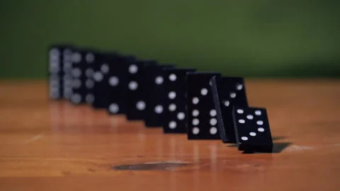 Domino game falling in slow motion Stock Footage 154334433