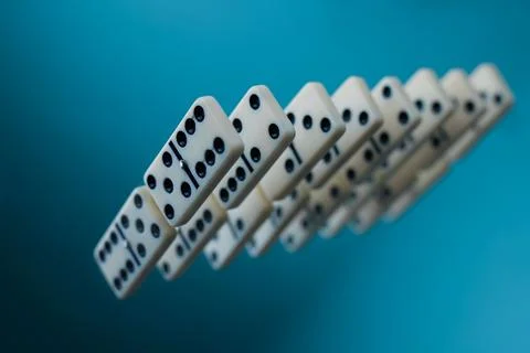 Domino game on a mirror surface 4 Stock Photos