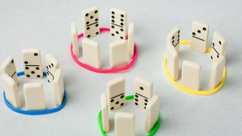 Domino represent human teams with different psyhological traits Stock Photos