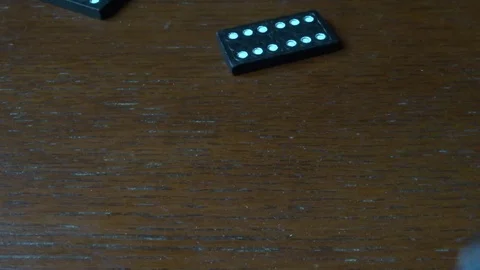 Dominoes are falling down Stock Footage 98697980