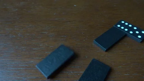 Dominoes are falling down Stock Footage 98698014