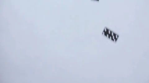 Dominoes falling down from above through picture Stock Footage 58761472