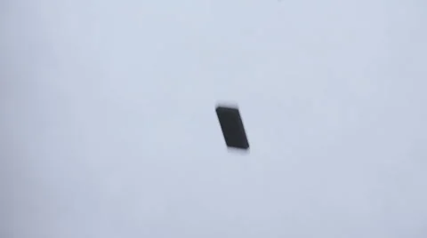 Dominoes falling down from above through picture Stock Footage 58761473