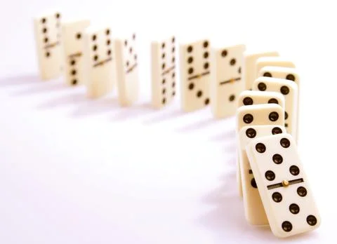 Dominoes falling down Stock Photos