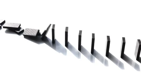 Dominos falling over in jerky motion. Stock Footage 229189279