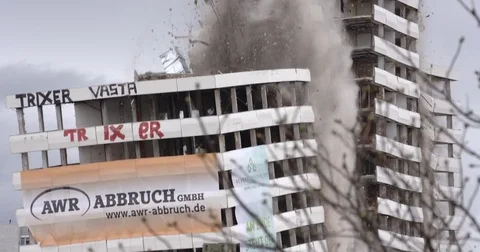 Domolition of a building with explosive in Germany Stock Footage 73631090