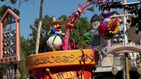 Donald Duck on the 'Three Caballeros'  float at Mickey’s Parade in Disneyland. Stock Footage 151478786