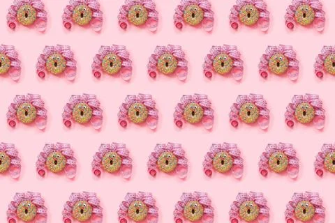 Donat pattern on pink background. Abstract funny face of woman from donut wit Stock Photos