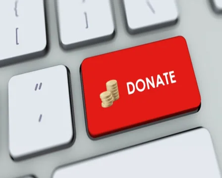 Donate button on computer keyboard. Key is pressed, click for HD Stock Footage 35647929