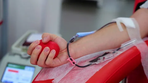 Donating blood is a good thing and made to others that he is waiting for hope. Stock Footage 327085157