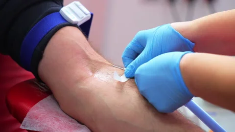 Donating blood is a good thing and made to others that he is waiting for hope. Stock Footage 327085442