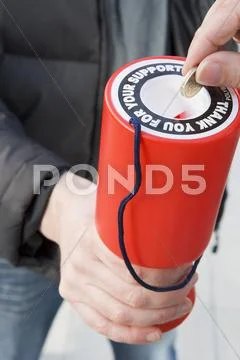Donating Money To Charity Stock-Fotos