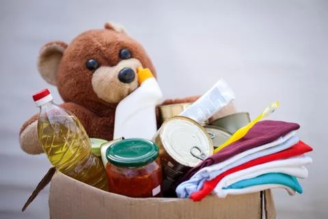 Donation box with stuff Stock Photos