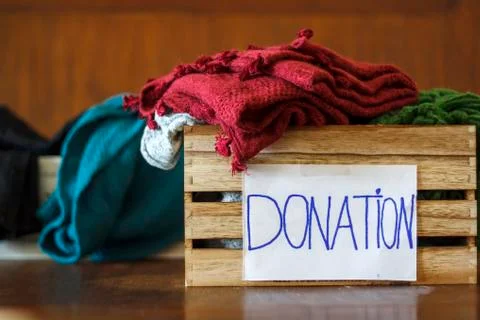 Donation boxes with clothes Stock Photos
