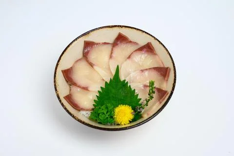 Donburi sliced raw hamachi set on japanese rice Stock Photos